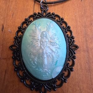 Teal & White Resin Cabochon In Black Metal Frame On 16-18 Cord Necklace